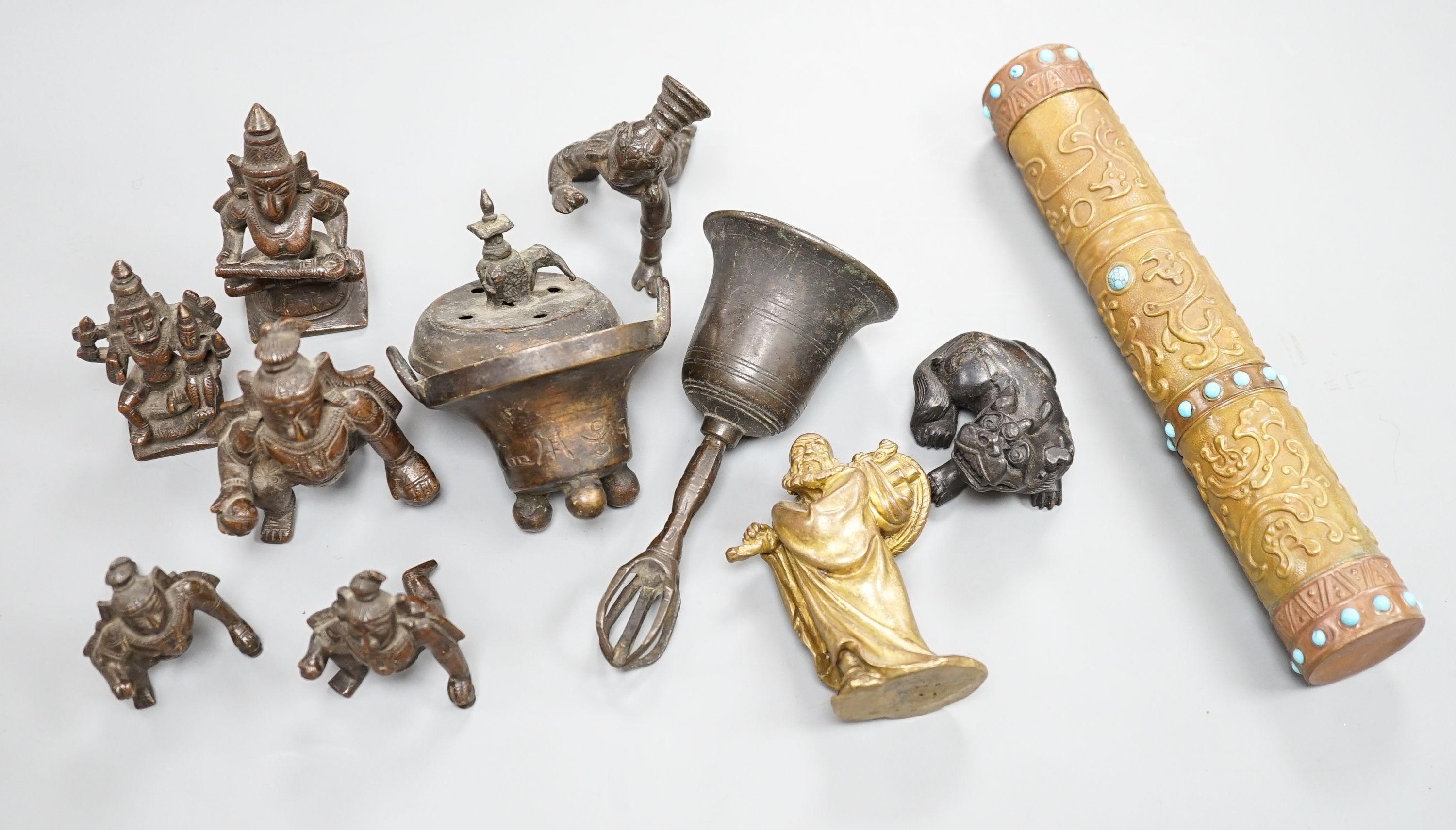 A Chinese gilt copper figure, a Chinese Dog of Fo, a bell, a censer, six Indian bronze figures and a scroll box